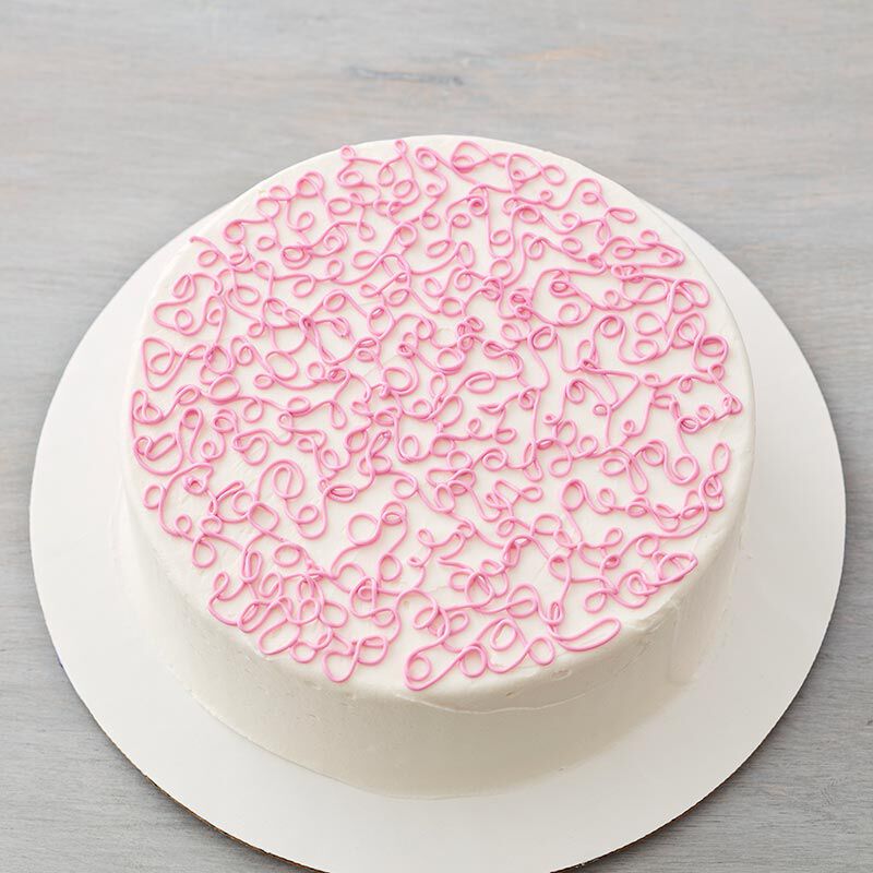 Sotas technique piped on the top of a round cake image number 0